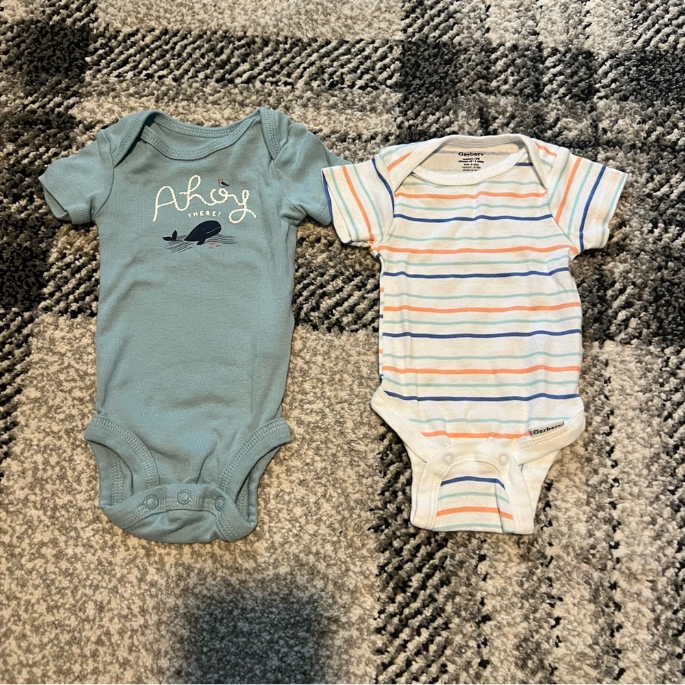 Bundle of 2 newborn baby onesies Carter’s and Gerber